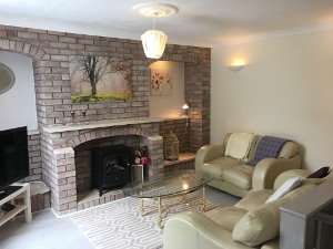 Sitting Room with 'limewash' brick fireplace