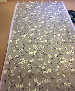 sew fabric to backing panel