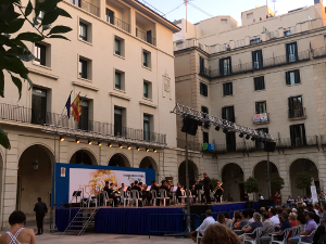 Brass concert with town hall buildings