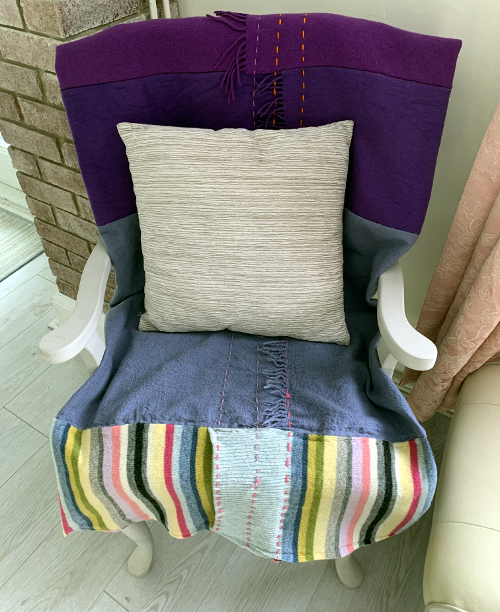 Upcycled wool rainbow throw by Amanda Howse